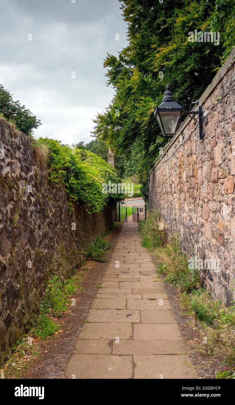 Duddingston Village path which leads to Duddingston Loch in Edinburgh, Scotland, UK Stock Photo