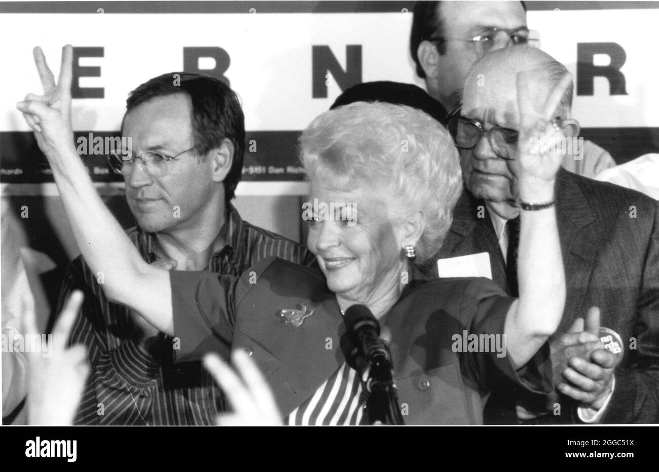 Austin Texas USA, 1990: Ann Richards flashes the V for victory sign to supporters during an election-night rally after coming out on top of the Democratic primary voting for governor. She failed to win 50% of the vote in the three-way race, however, so will face Texas Atty. Gen. Jim Mattox in a runoff in April. ©Bob Daemmrich Stock Photo