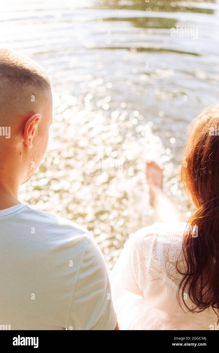 A couple in love wetting their feet in the sea. Summer holidays. Vintage  Stock Photo - Alamy