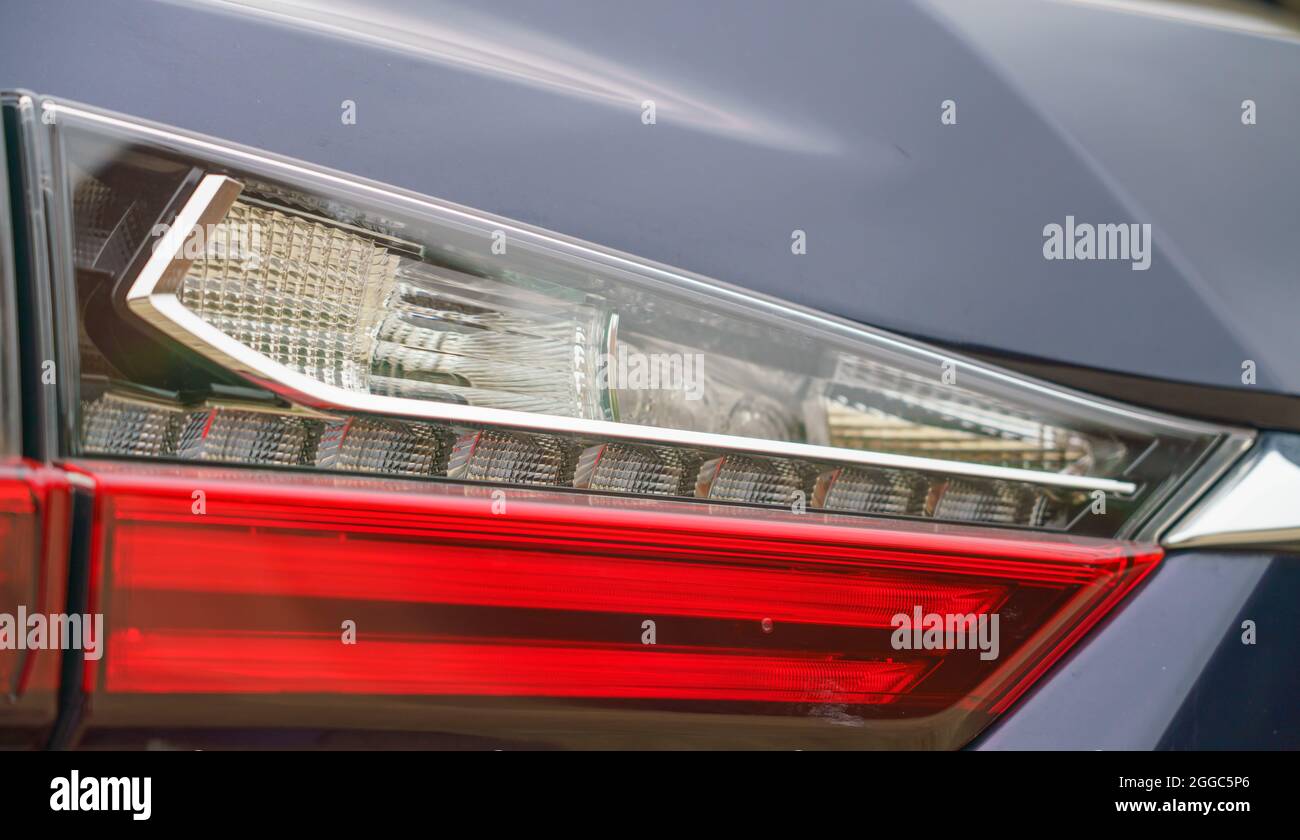 led rear light strip on a Lexus RX450h Premier Self-charging Hybrid luxury SUV Stock Photo