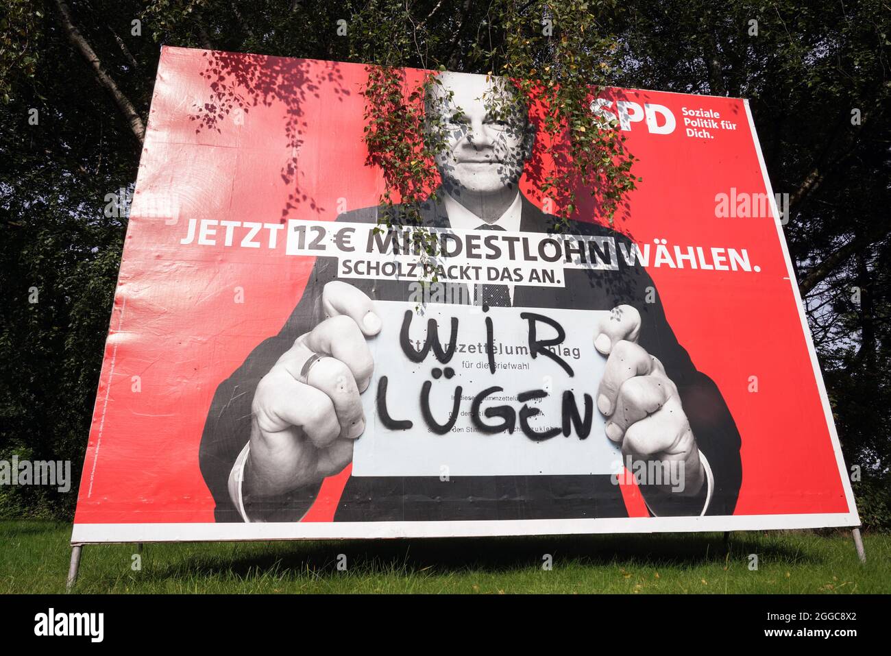 Bundestagswahl 2021, SPD-Kanzlerkandidat Olaf Scholz auf einem beschmierten Wahlplakat der SPD. Dortmund, 30.08.2021 Stock Photo