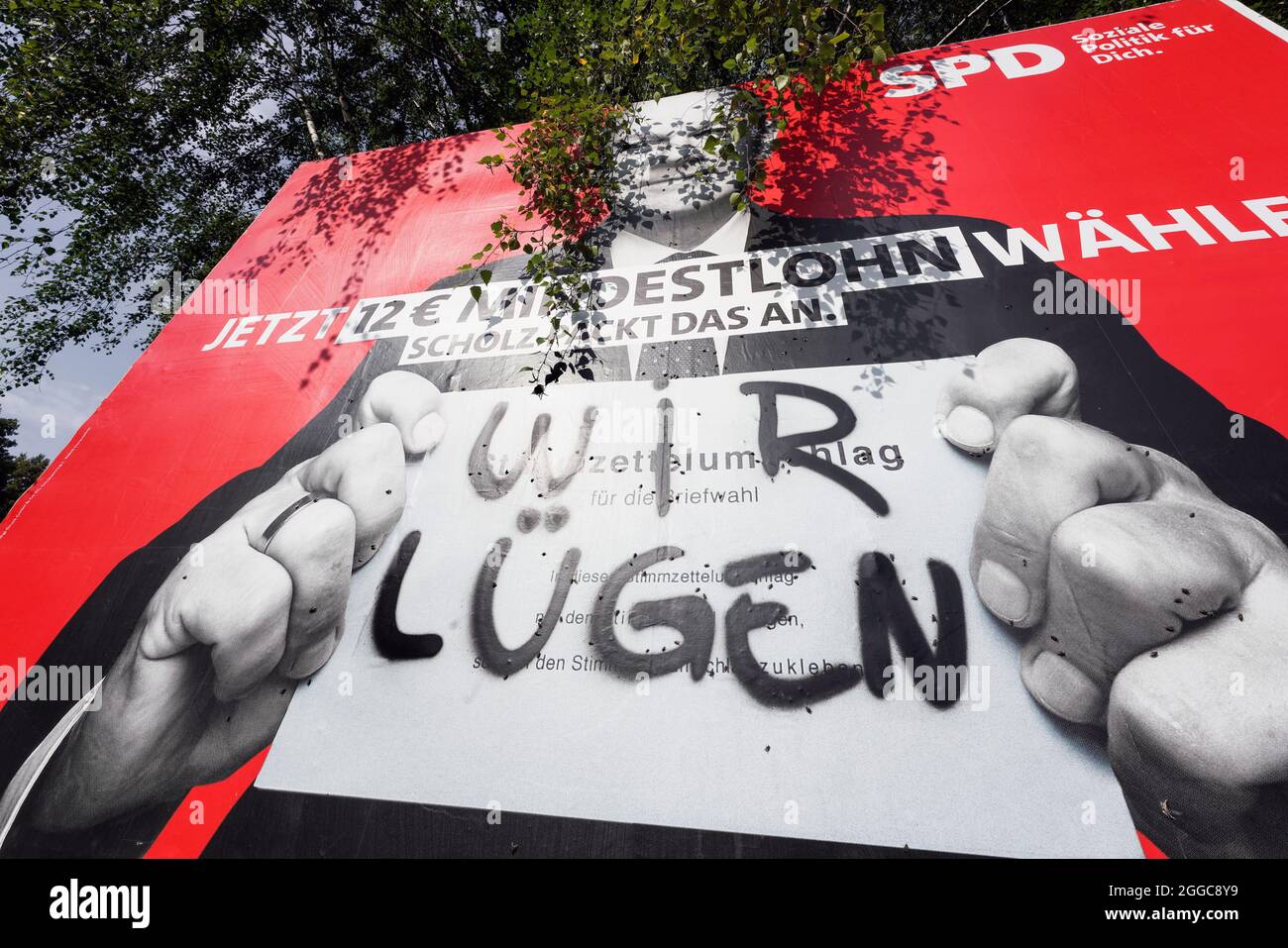 Bundestagswahl 2021, SPD-Kanzlerkandidat Olaf Scholz auf einem beschmierten Wahlplakat der SPD. Dortmund, 30.08.2021 Stock Photo