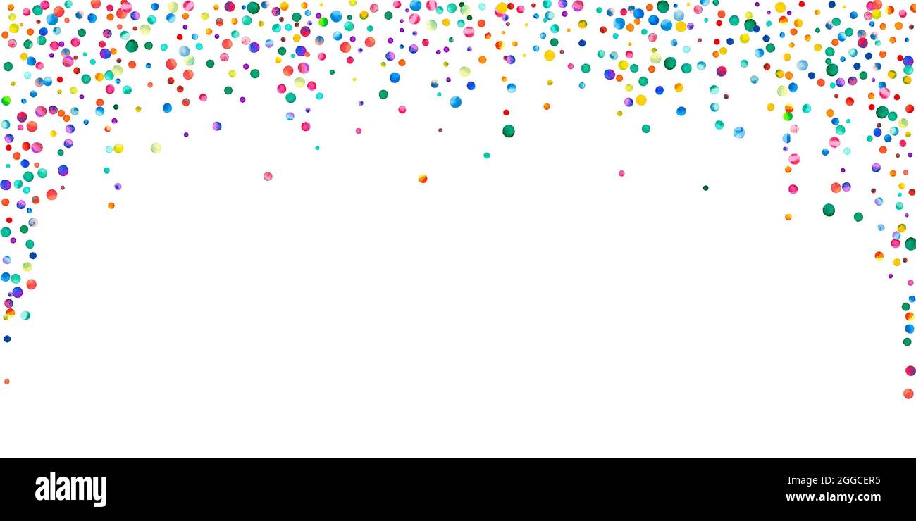Watercolor confetti on white background. Adorable rainbow colored dots. Happy celebration wide colorful bright card. Neat hand painted confetti. Stock Photo