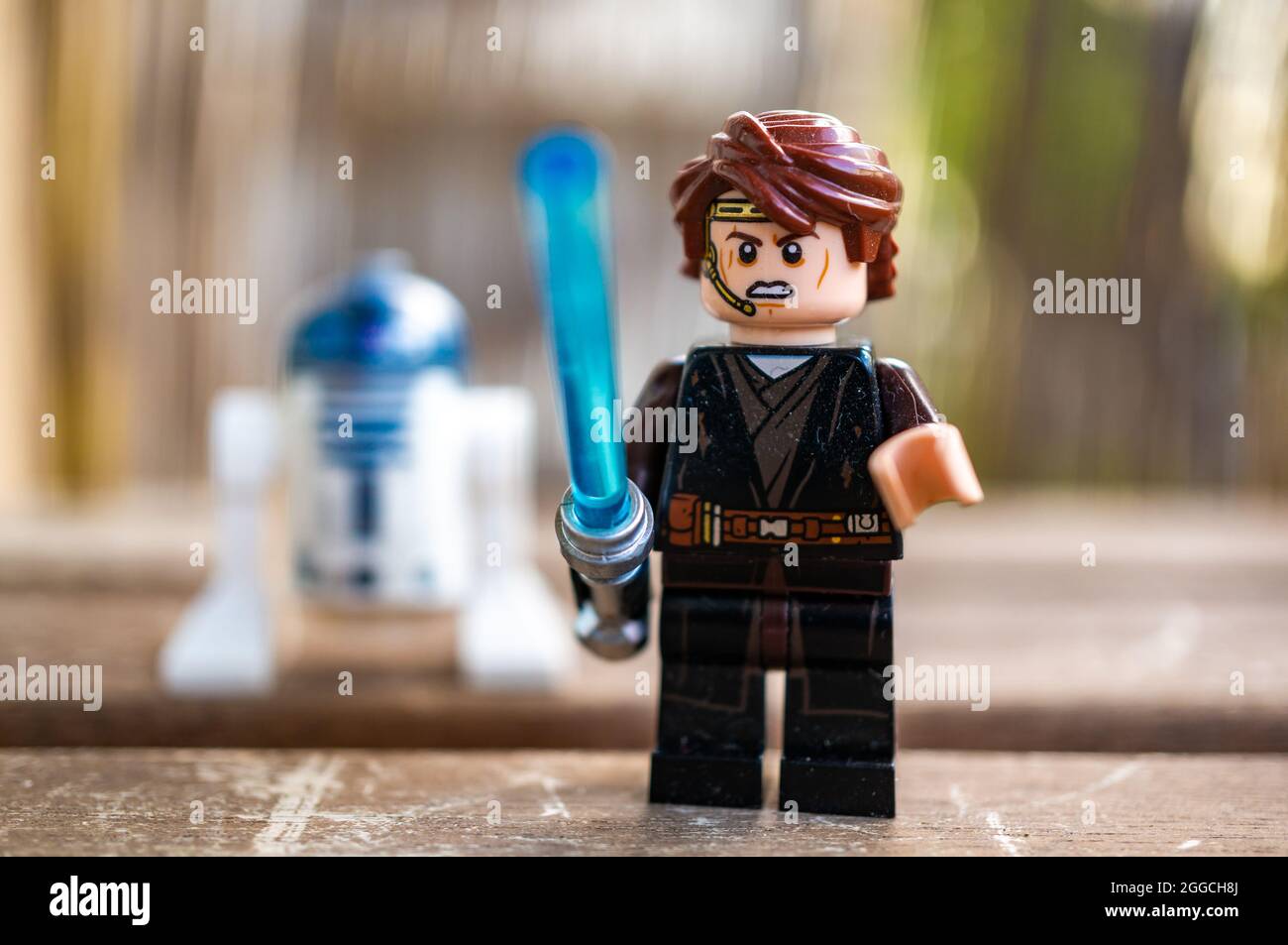 POZNAN, POLAND - Aug 09, 2021: The Lego Star Wars Anakin Skywalker toy figurine holding a blue laser sword Stock Photo