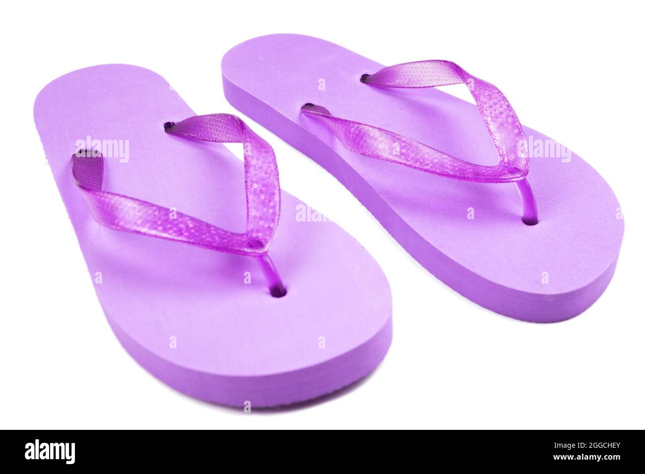 purple rubber beach flip flops on a white background, isolate Stock ...