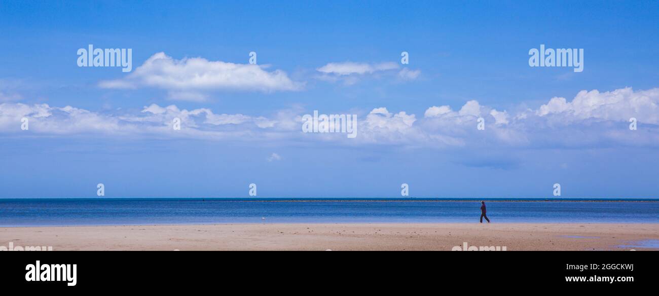Tropical sandy beach and clear blue sea with beautiful sky with clouds ...