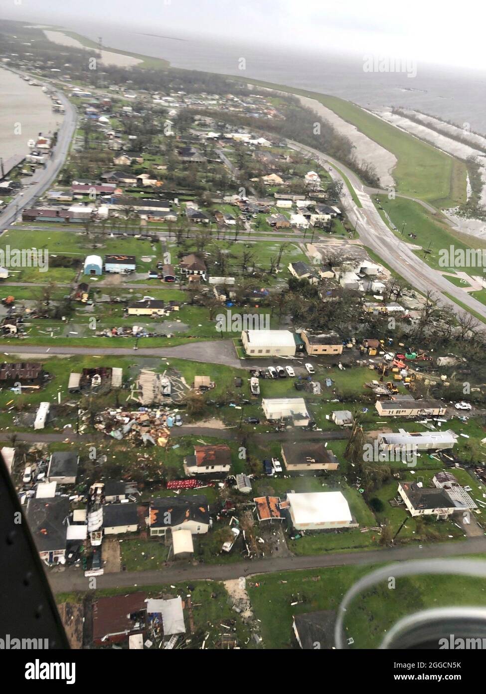 Galliano, United States Of America. 30th Aug, 2021. Aerial photo showing the aftermath of Hurricane Ida along the Gulf Coast August 30, 2021 in Galliano, Louisiana. Ida is packing winds of 150 mph made landfall 16-years ago to the day of Hurricane Katrina. The Coast Guard conducts Hurricane Ida post-storm overflights along the Gulf Coast on August 30, 2020. Aircrews conducted overflights near, LA to assess damage and identify hazards. (U.S. Coast Guard courtesy photo) Credit: US Coast Guard/Alamy Live News Stock Photo