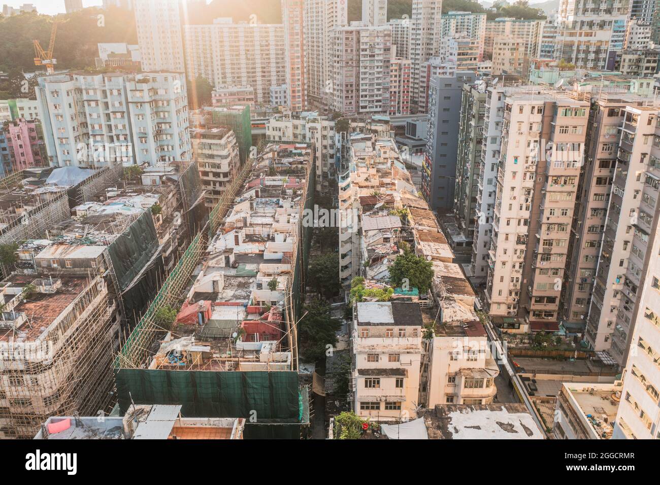 Kowloon Rooftops Aerial angle of Colorful messy rooftop on dense old residential house ...