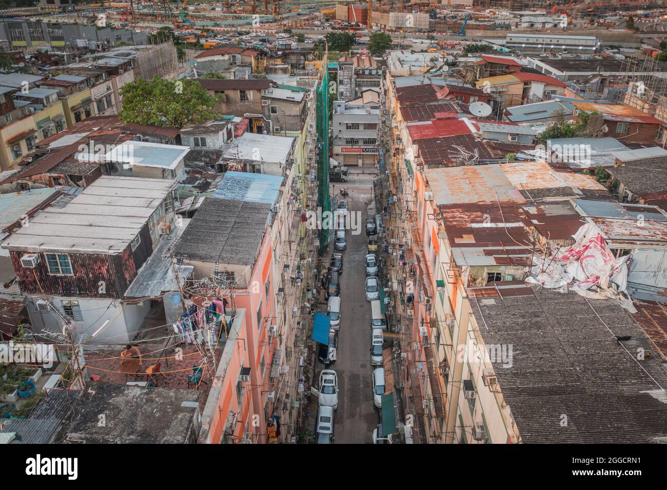 Kowloon Rooftops Aerial angle of Colorful messy rooftop on dense old residential house ...