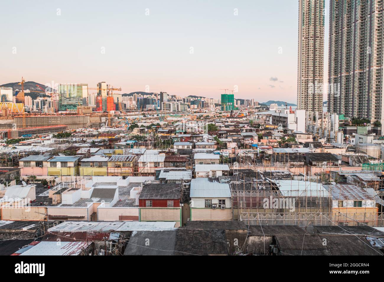 Kowloon Rooftops Aerial angle of Colorful messy rooftop on dense old residential house ...