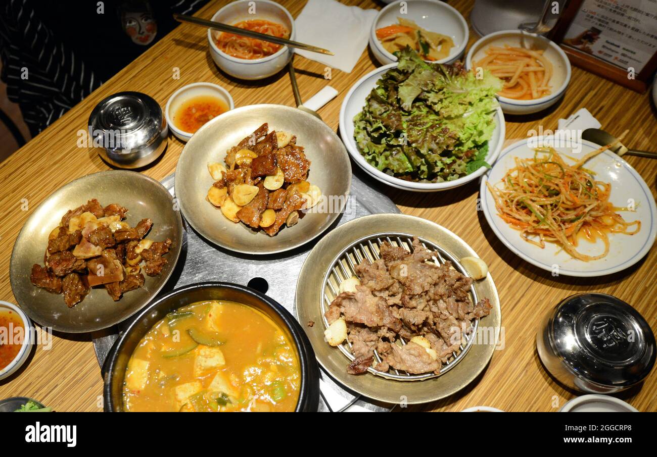 Korean grilled beef with Korean Kimchi and salads. Seoul, South Korea