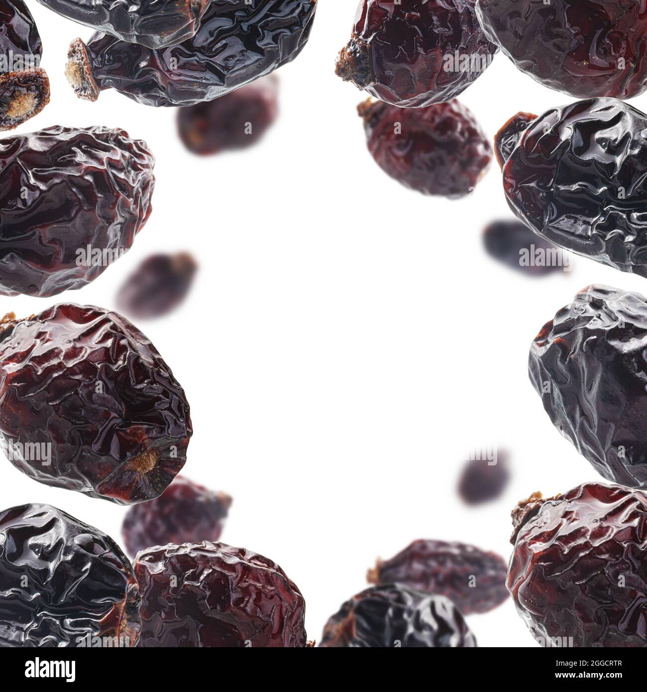 Dried rosehip berries levitate on a white background Stock Photo Alamy