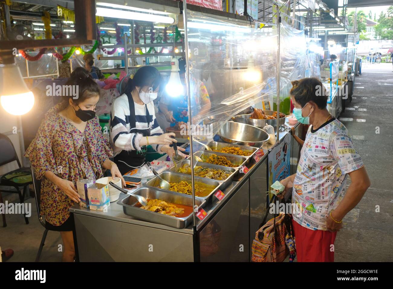 A Thai cooked and fresh food market on Phuket Island Stock Photo