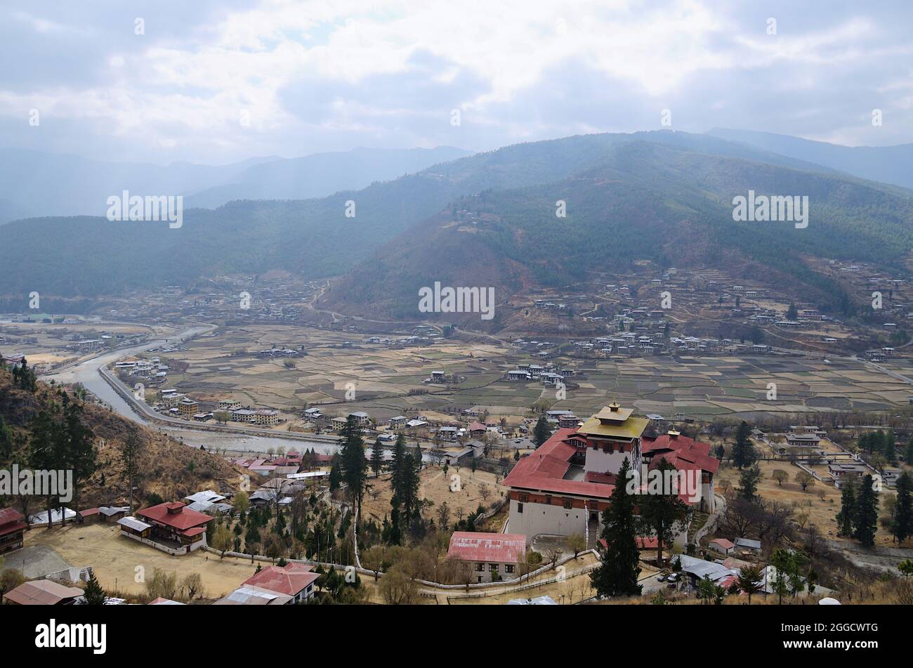 Paro is a historic town with many sacred sites and historical buildings scattered throughout the area. Built in 1646, Rinpung Dzong houses the monasti Stock Photo