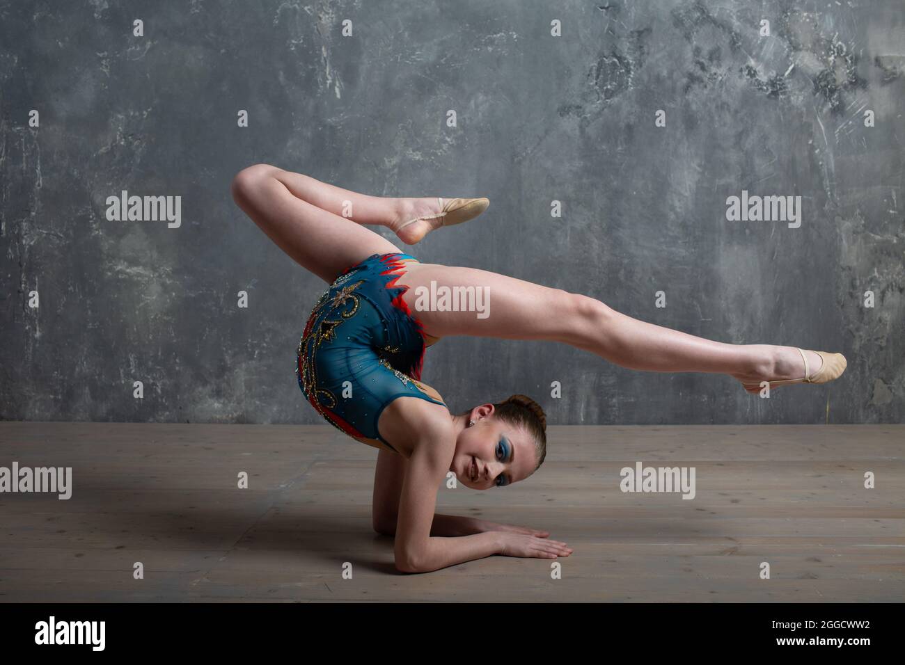 Young girl professional gymnast woman dance rhythmic gymnastics at studio  Stock Photo - Alamy