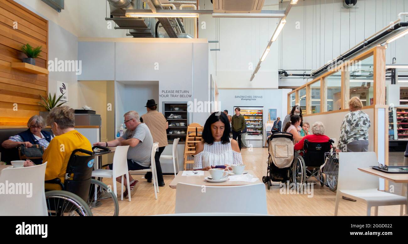 Marks and Spencer Food Shop café interior with customers enjoying refreshment Stock Photo