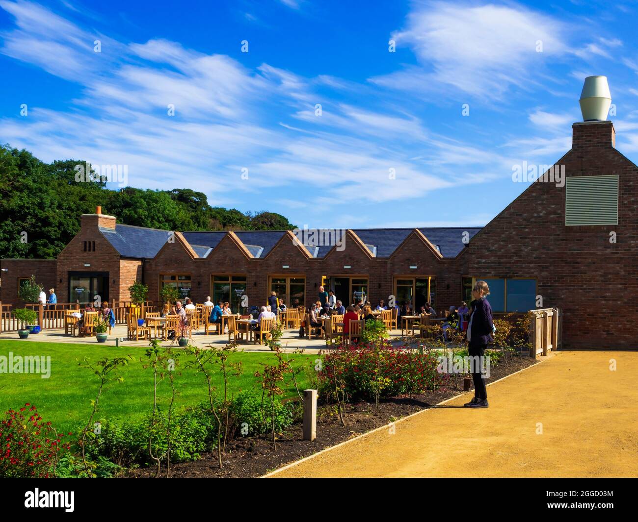 Exterior of the Tea rooms at the Kirkleatham Walled Garden visitor attraction with people at tables outside on a sunny summers day Stock Photo