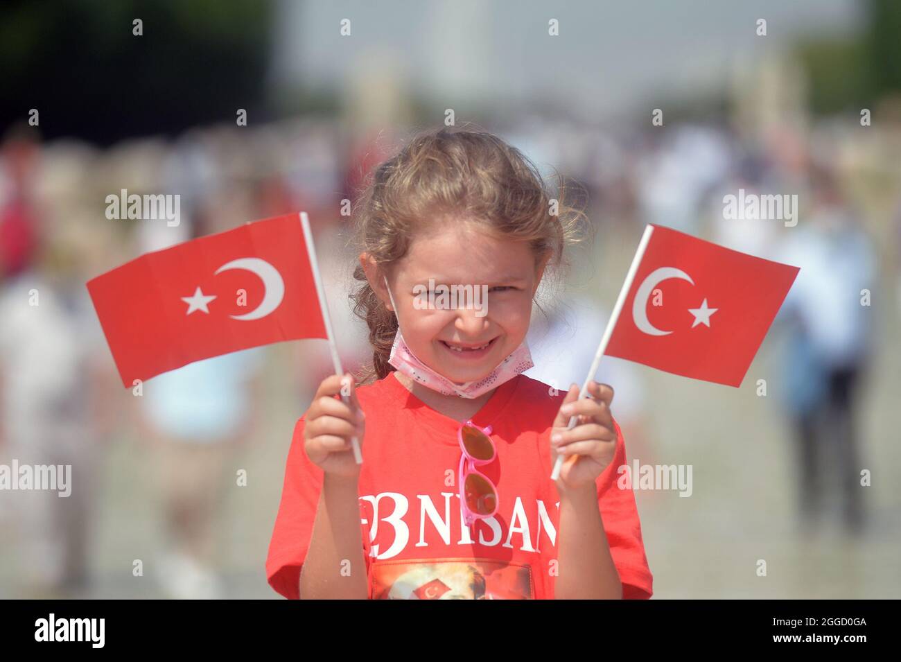 Ankara, Turkey. 30th Aug, 2021. A child celebrates the 99th Anniversary of Turkey's Victory Day at the Ataturk Mausoleum in Ankara, Turkey, on Aug. 30, 2021. Turkey on Monday celebrated the 99th anniversary of Victory Day, the day the Turks defeated the Greek forces at the Battle of Dumlupinar, the final battle of the Turkish War of Independence in 1922. Credit: Mustafa Kaya/Xinhua/Alamy Live News Stock Photo