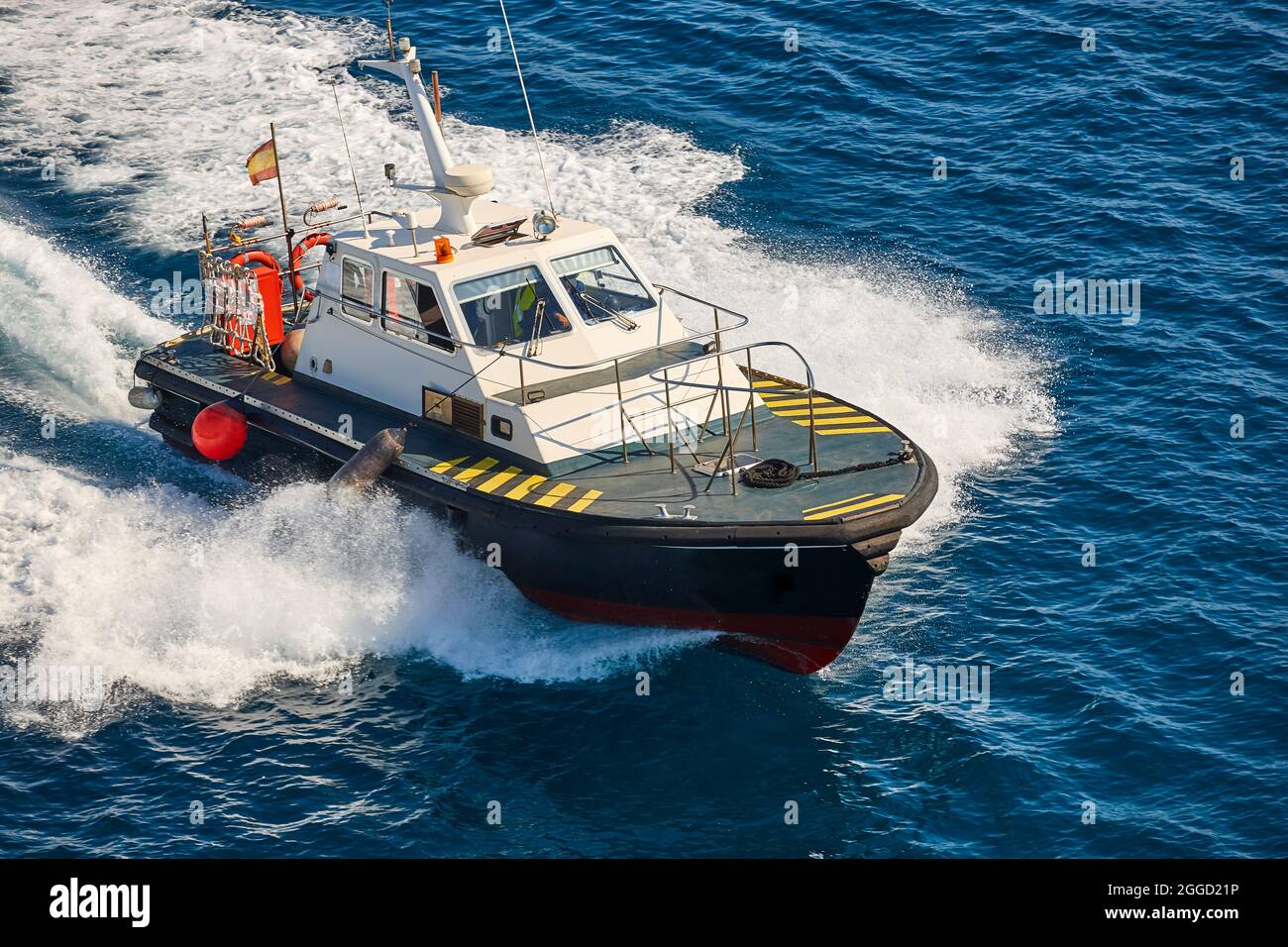 Pilot vessel operating on the sea. Harbor maritime control Stock Photo