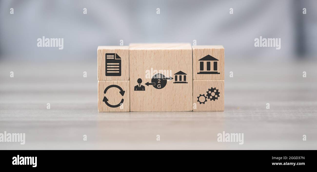 Wooden blocks with symbol of b2g concept Stock Photo - Alamy