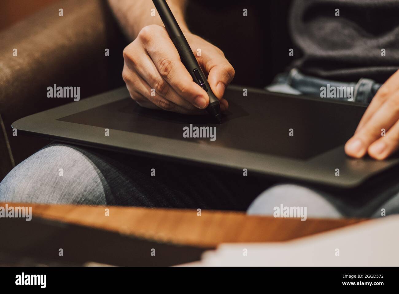 Close Up of a Person Drawing on a Graphics Tablet Stock Photo