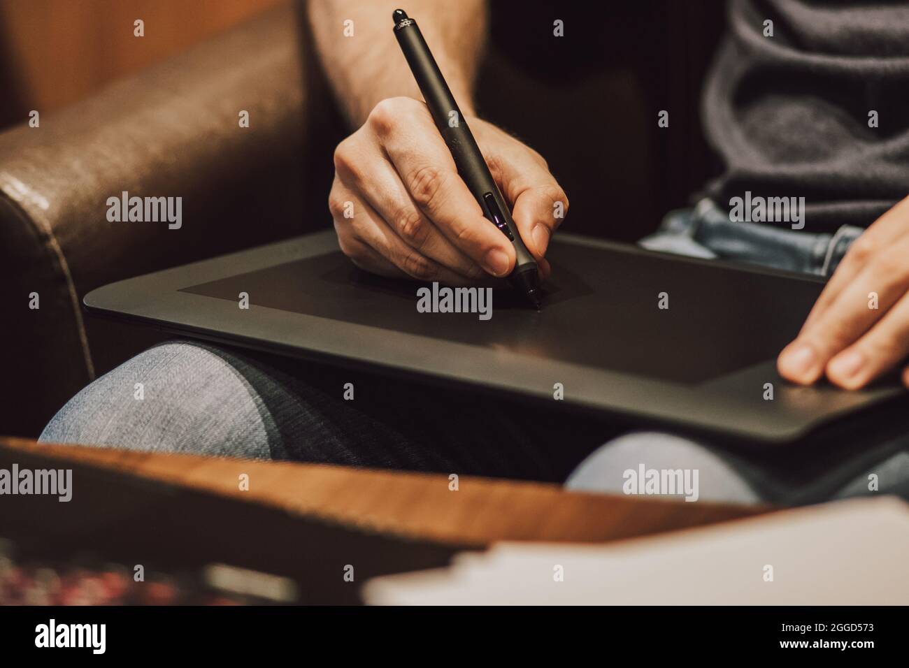 Close Up of a Person Drawing on a Graphics Tablet Stock Photo