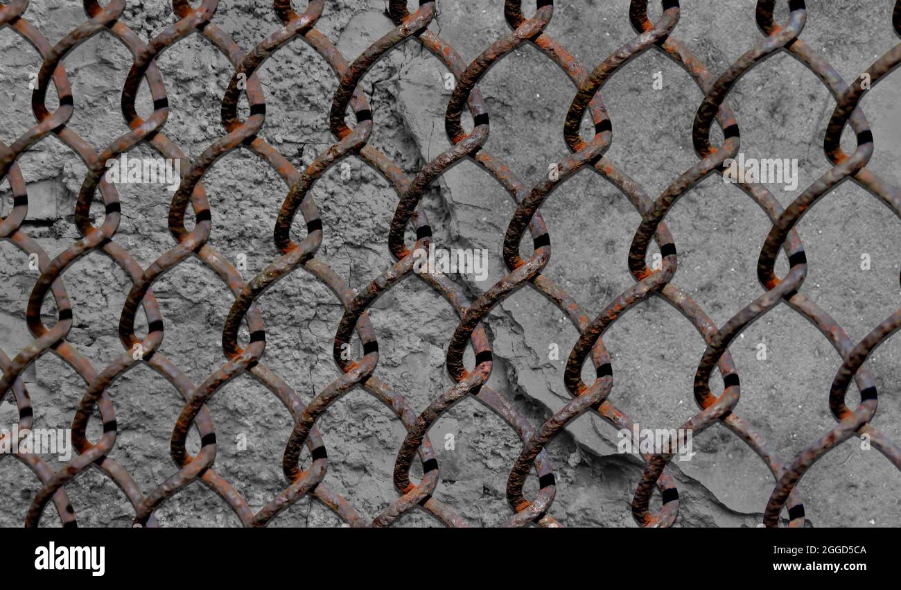Closed up steel wire mesh fence on blurred background Stock Photo - Alamy