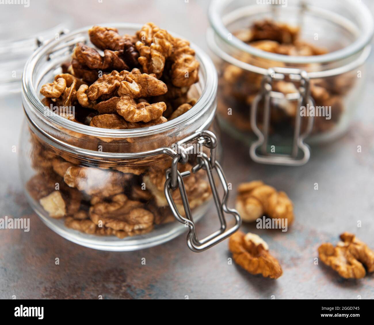 Walnuts without shell on a concrete background Stock Photo