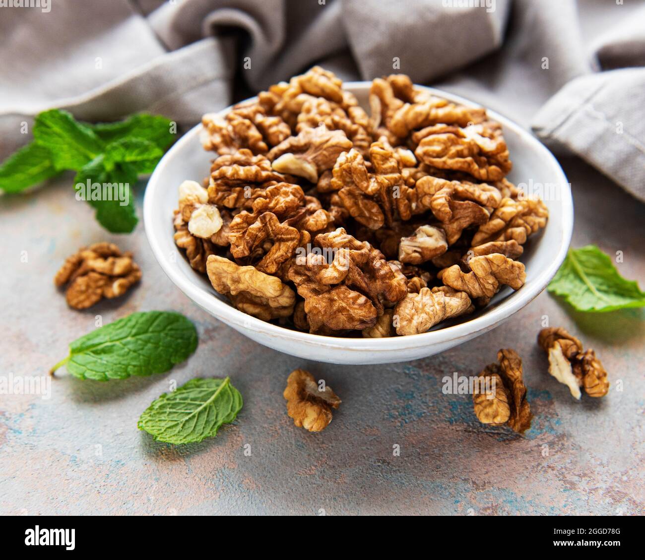 Walnuts  without shell on a concrete background Stock Photo