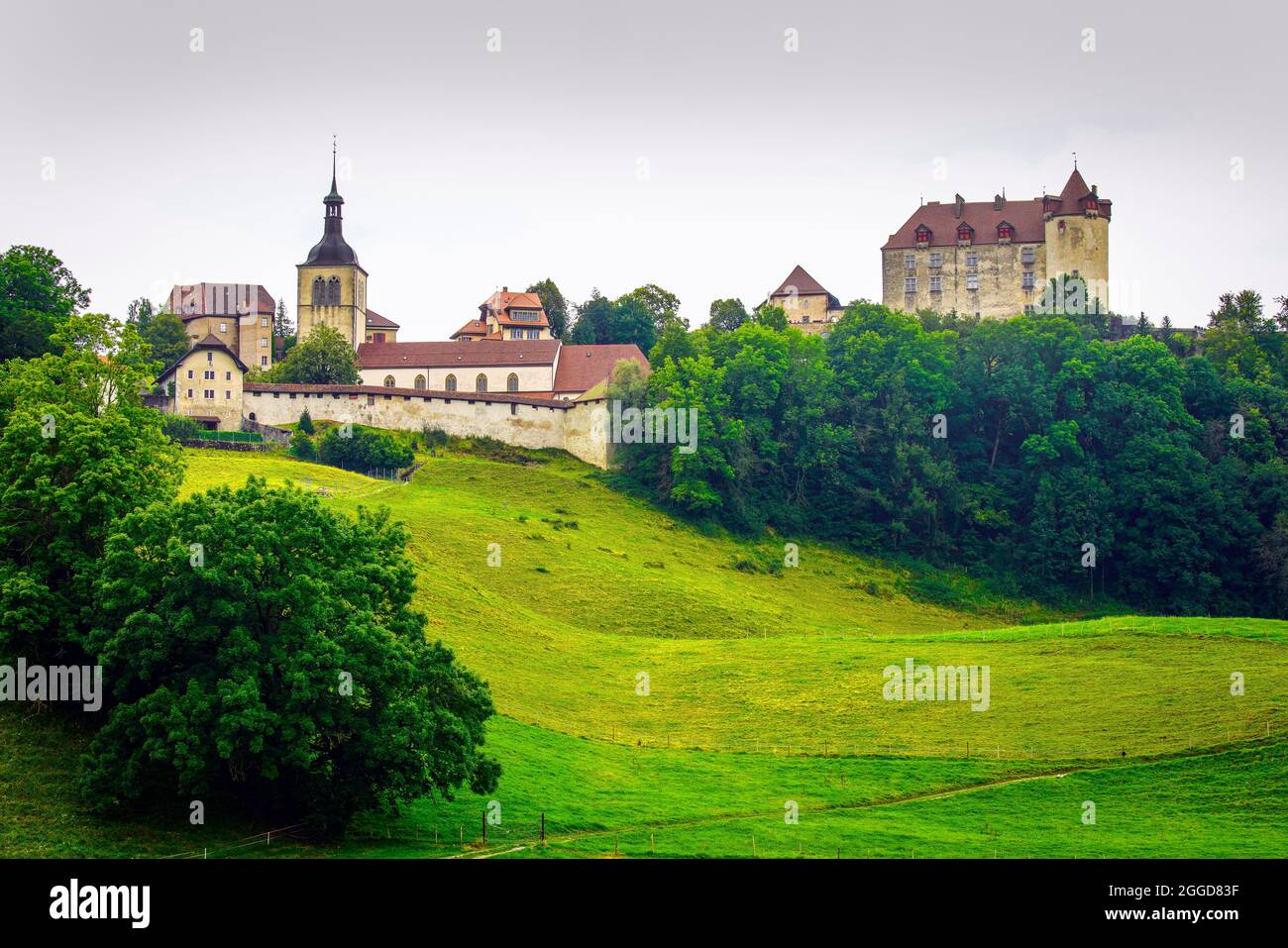 Panoramic view of medieval the castle village of Gruyères in alpine landscape. Canton Fribourg, Switzerland. Stock Photo