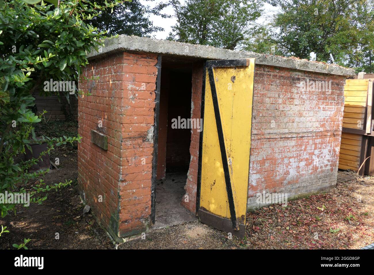 World War II airraid shelter in English garden. Built for families to shelter from enemy bombs