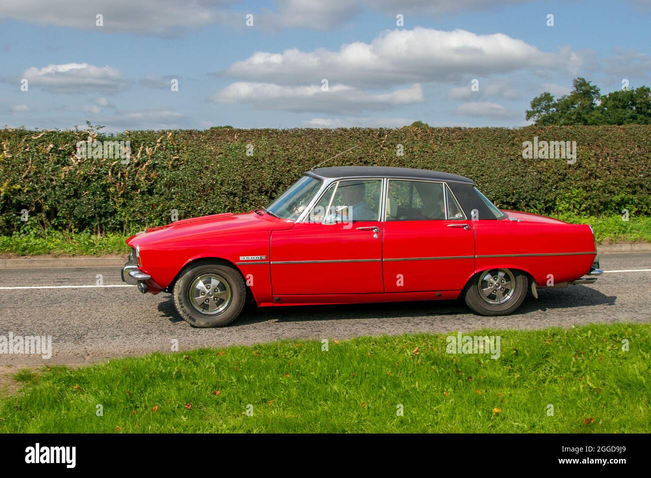 1973 70s red Rover 3500 S 3528cc 4dr British saloon en-route to Capesthorne Hall classic August car show, Cheshire, UK Stock Photo
