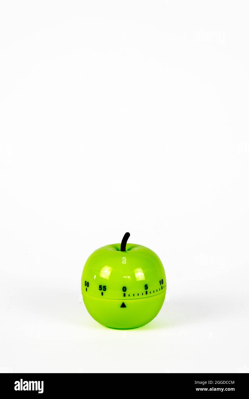 A kitchen timer in the shape of an apple. Stock Photo