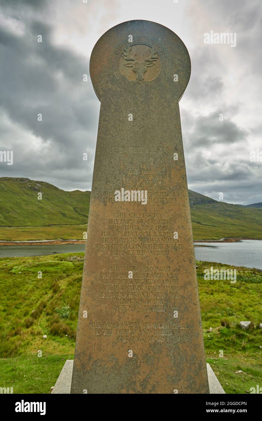 Memorial stone at Seaforth Castle to the establishment of the Seaforth Highlanders regiment in the Isle of Lewis in the Hebrides. Stock Photo
