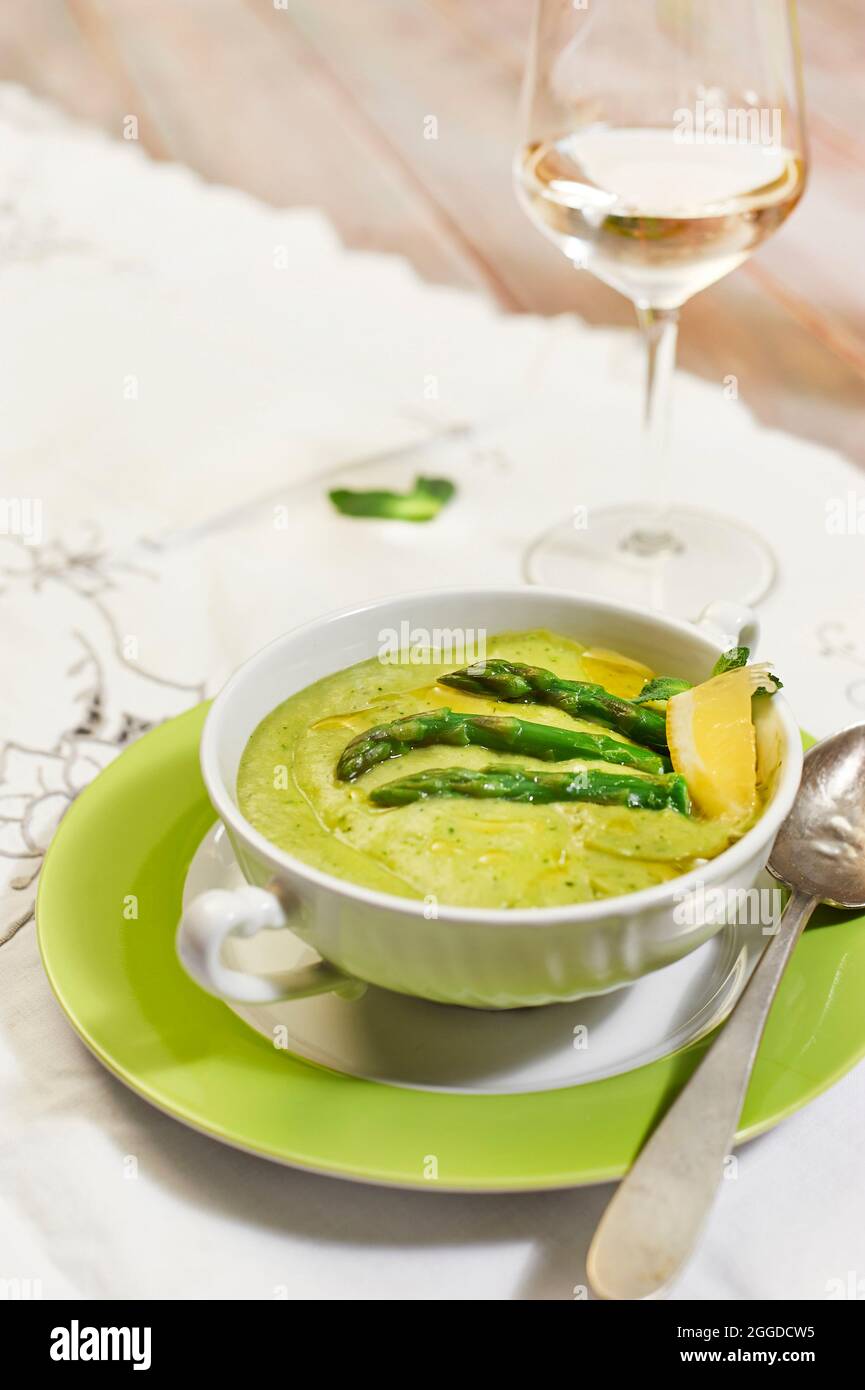 Asparagus pureed soup with sesame and lemon Stock Photo