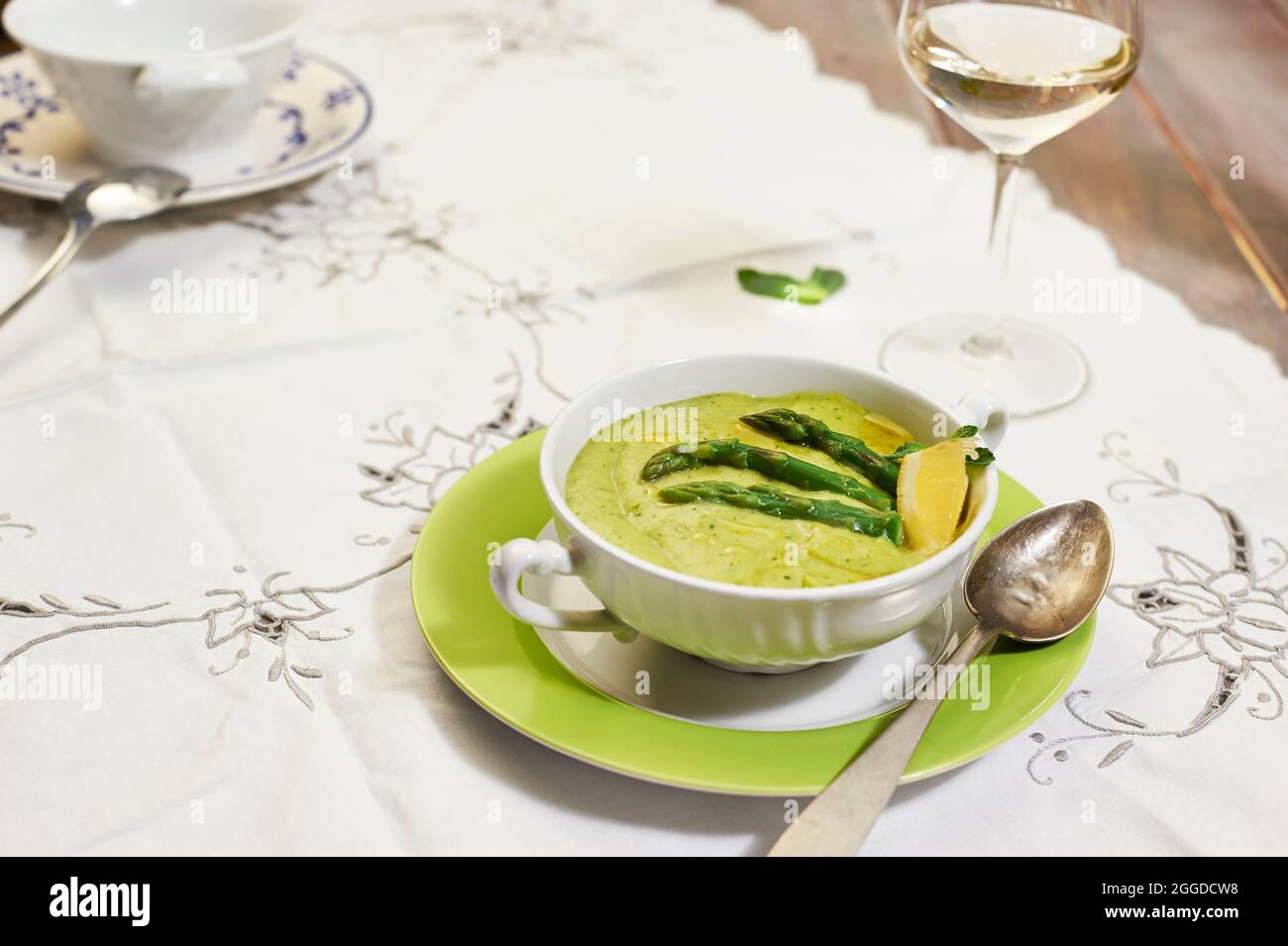 Asparagus pureed soup with sesame and lemon Stock Photo