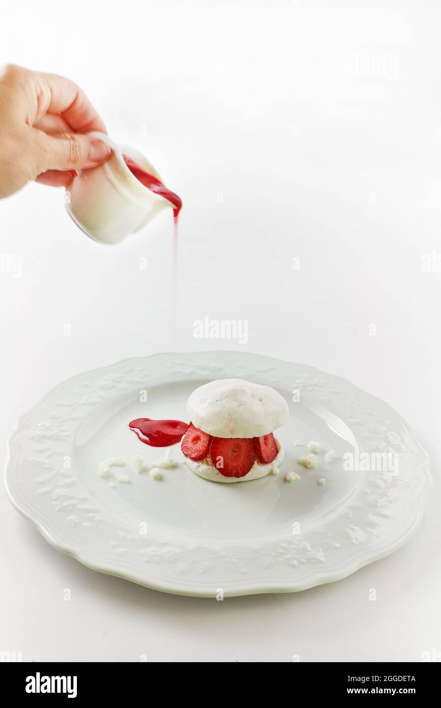 Chickpea water meringue with staìrawberry Stock Photo Alamy