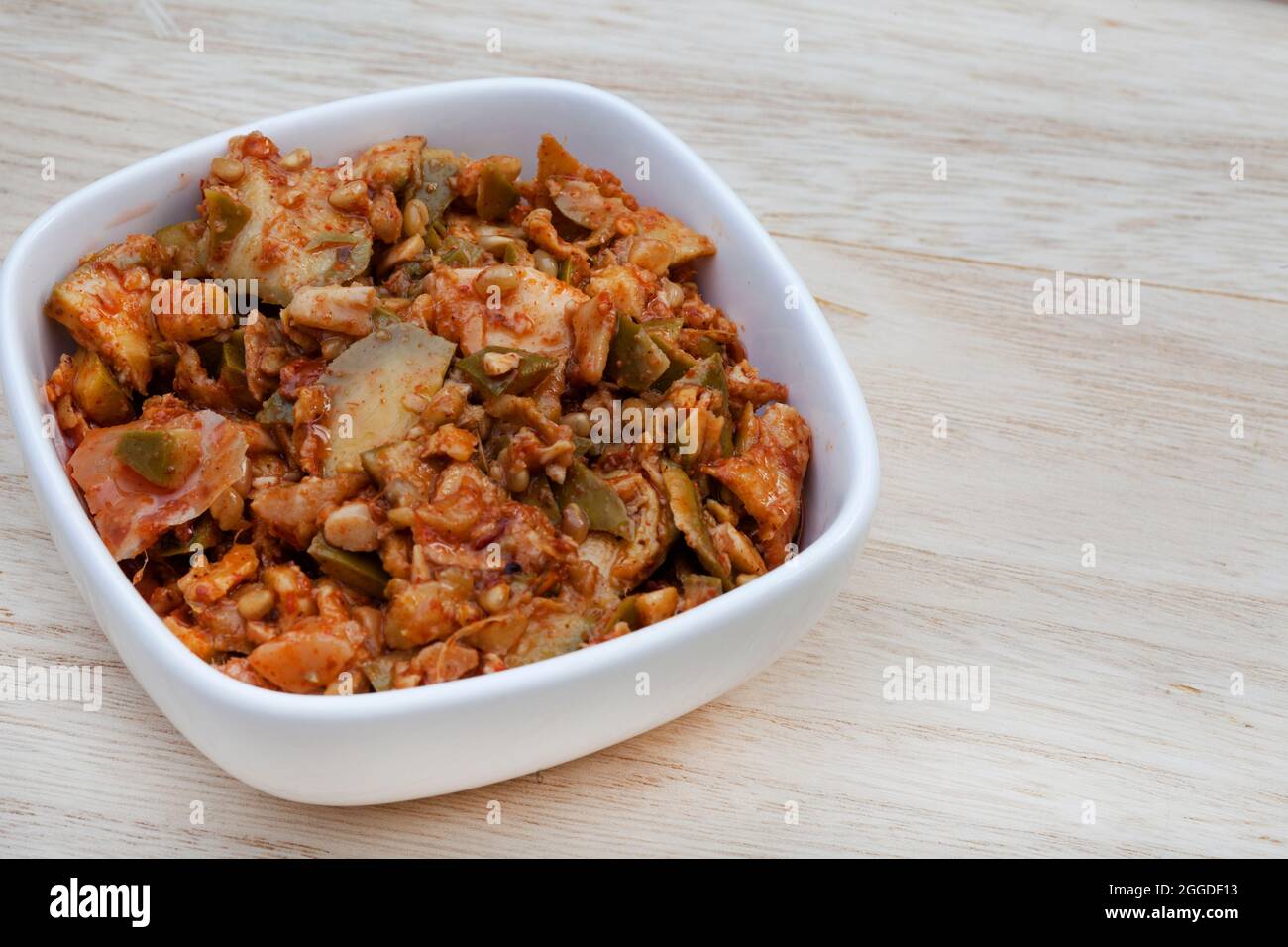 Traditional spicy green mango achar Stock Photo Alamy