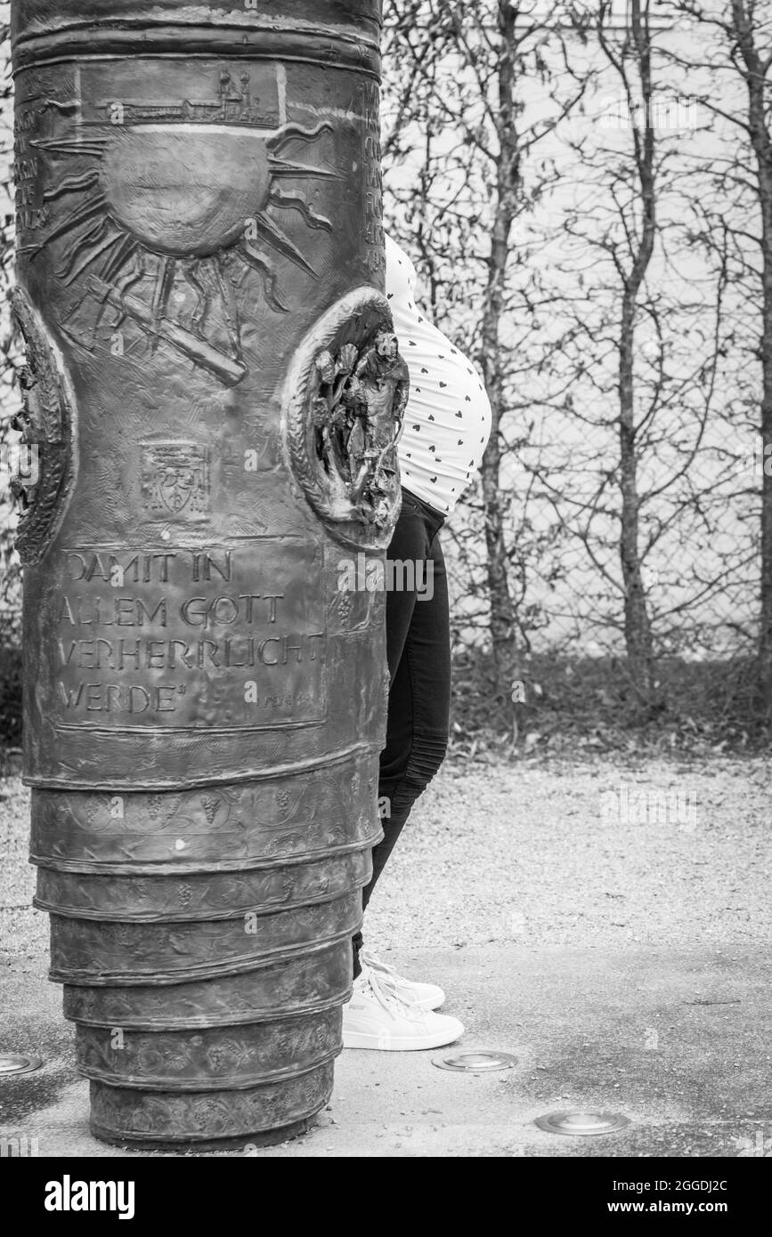 Creative baby bump photo shoot with pregnant mother and father Stock