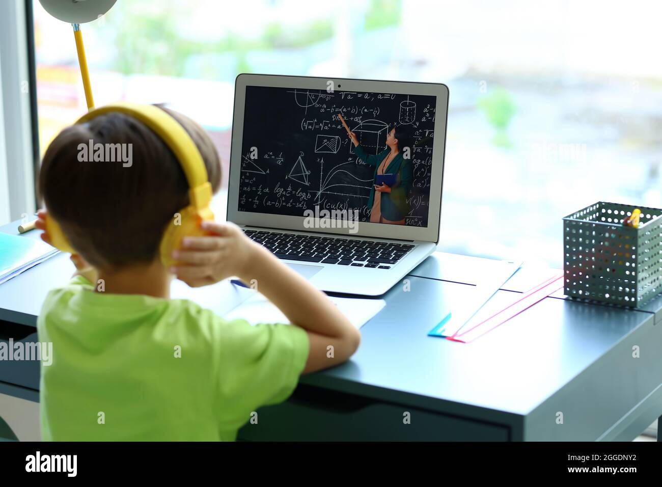 Little boy studying Math online at home Stock Photo - Alamy