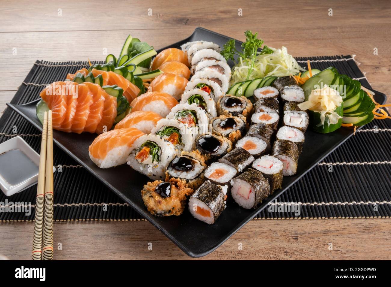 Mixed sushi roll and salmon sashimi Stock Photo Alamy