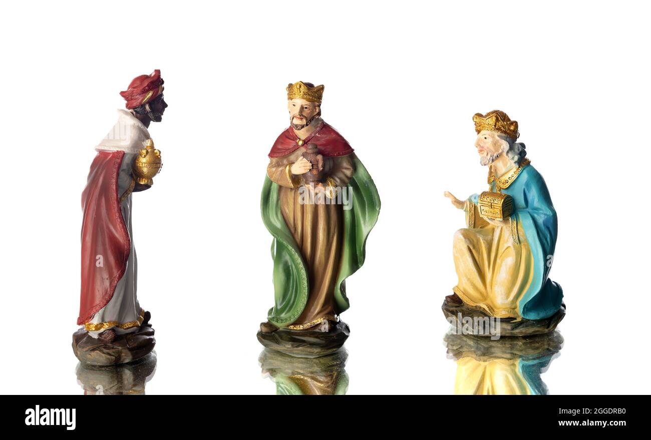 The three wise men. Ceramic figures isolated on white background Stock