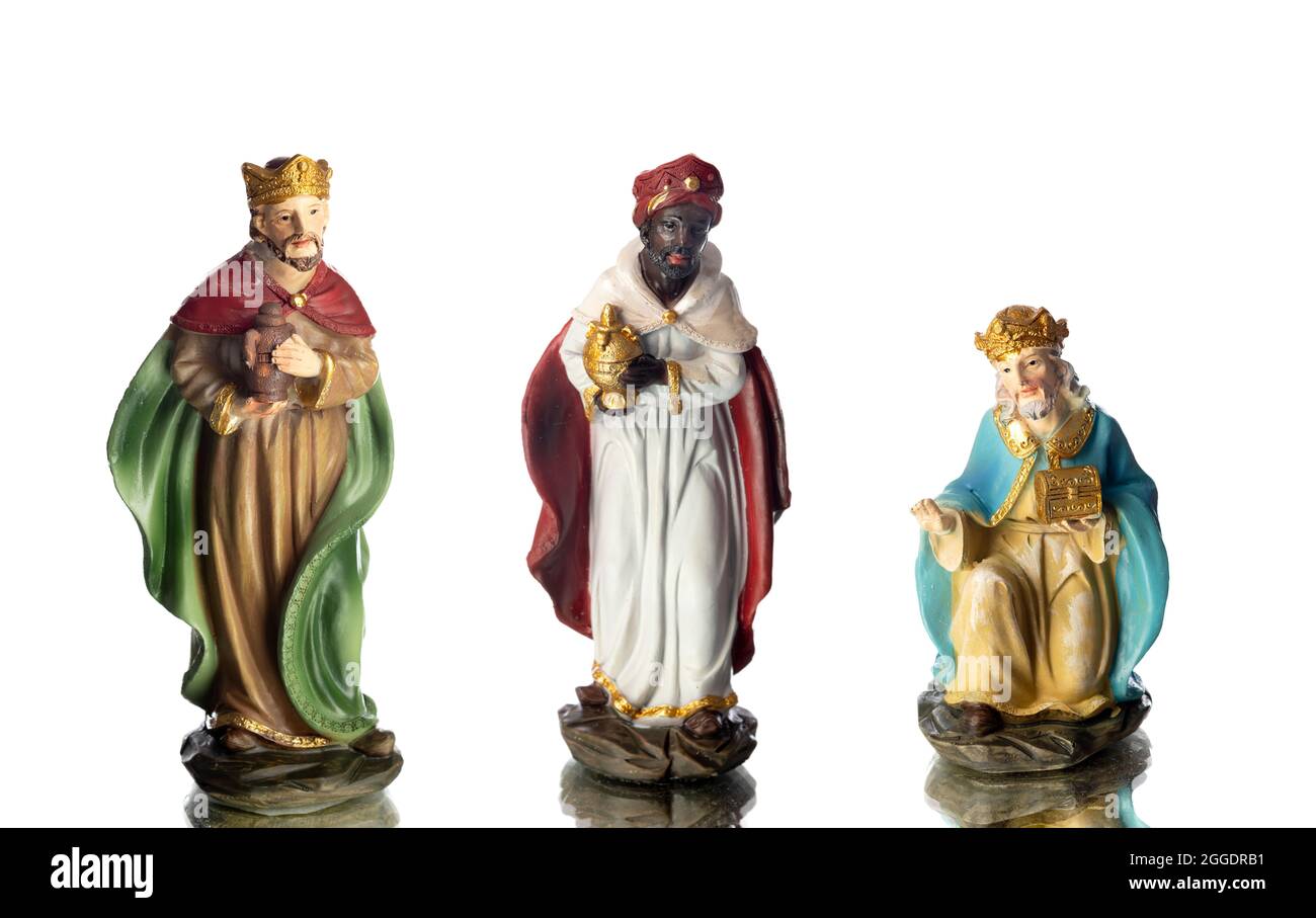 The three wise men. Ceramic figures isolated on white background Stock