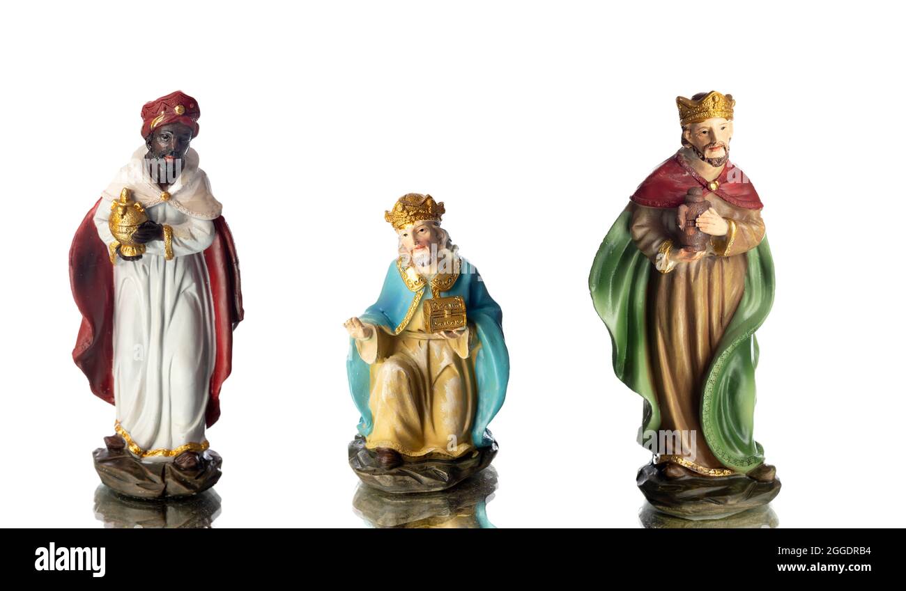The three wise men. Ceramic figures isolated on white background Stock