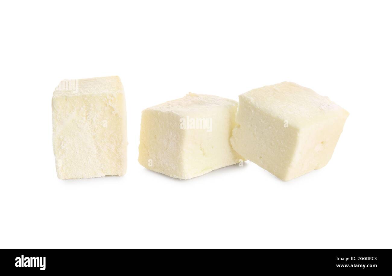 Tasty sweet marshmallows on white background Stock Photo - Alamy