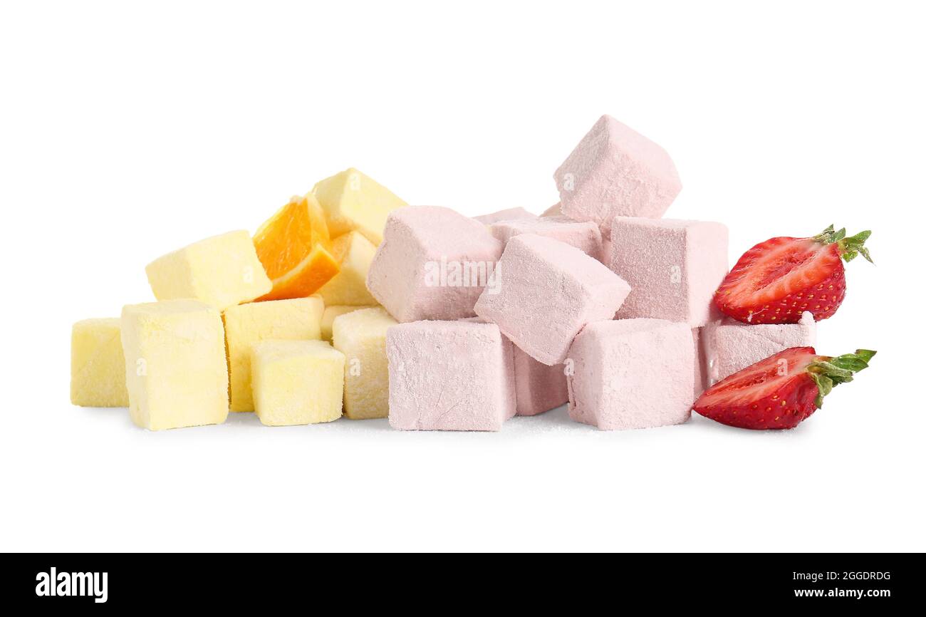 Tasty sweet marshmallows, strawberry and orange on white background ...