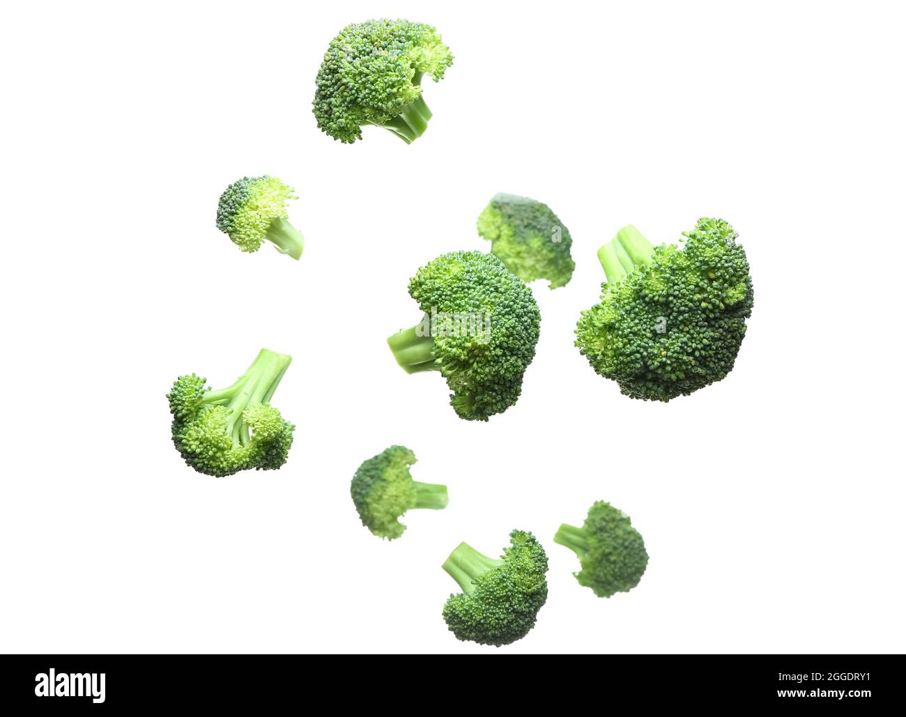 Flying broccoli on white background Stock Photo - Alamy