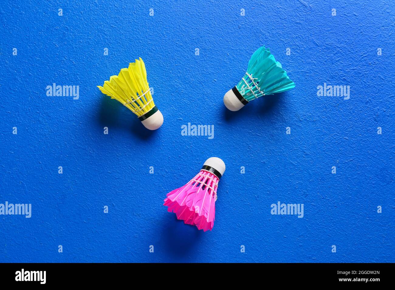 Shuttlecock Color Badminton shuttlecocks on color background Stock Photo - Alamy