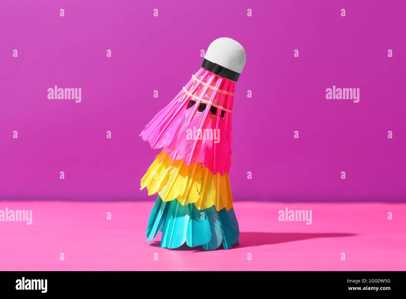 Shuttlecock Color Badminton shuttlecocks on color background Stock Photo - Alamy