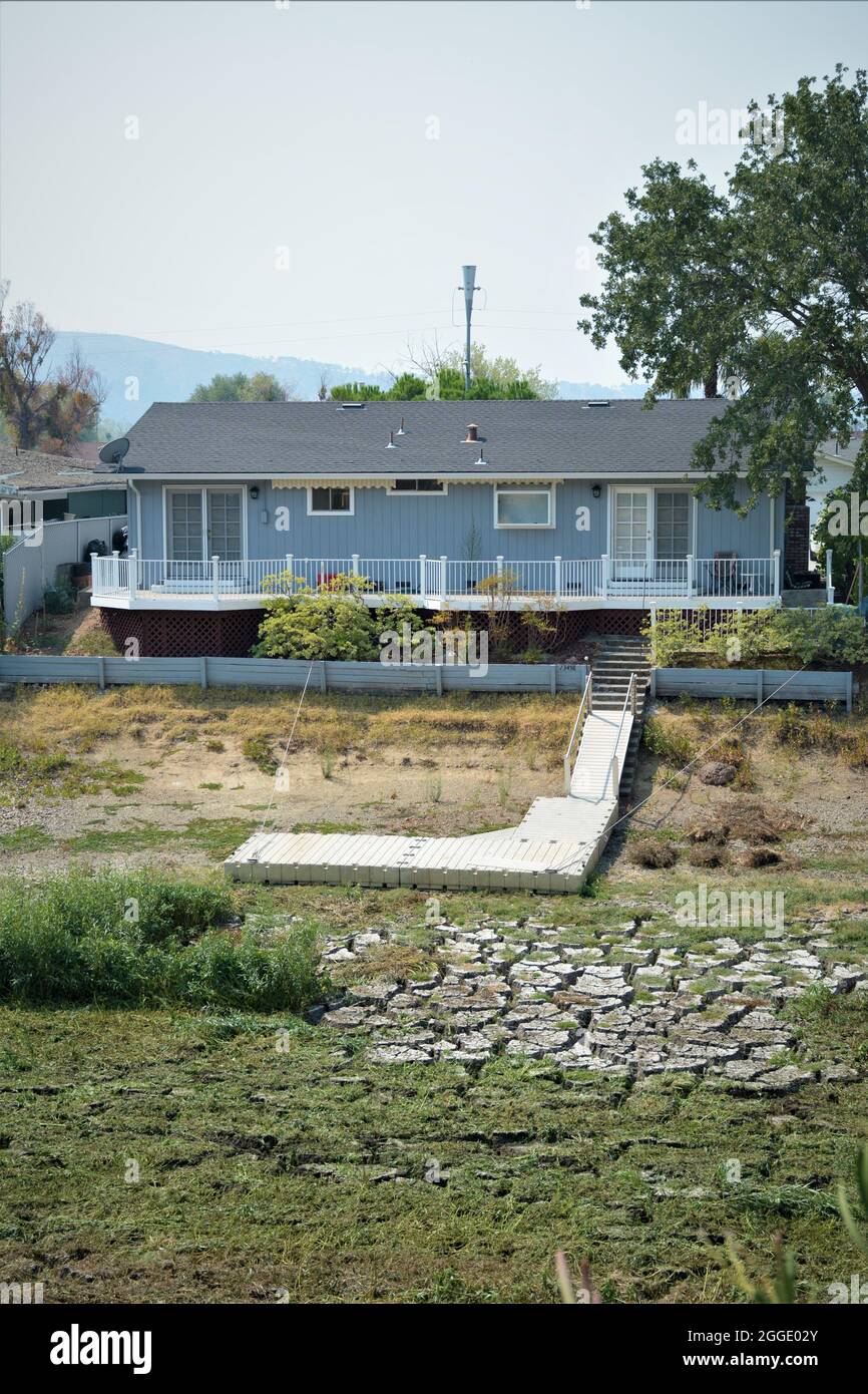 House home on dried up canal on Clear Lake CA because of drought and
